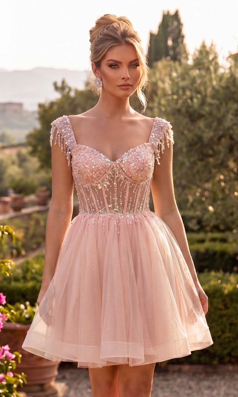 A woman stands outdoors in a garden at sunset, wearing the Chicas C356 short homecoming dress in blush—featuring a fitted, sequined bodice and a tulle fit-and-flare skirt.